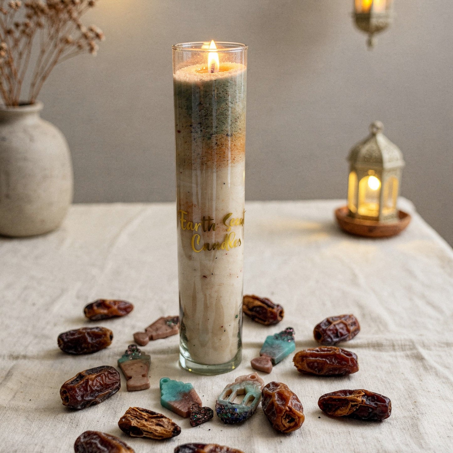 A tall glass container filled with our premium sand wax.