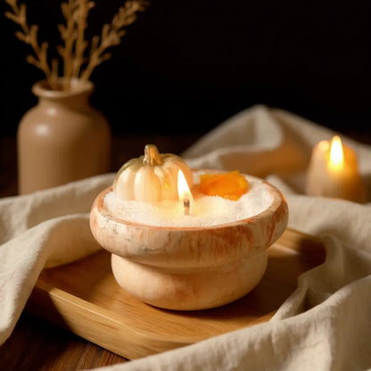 Handmade wide irregular marble concrete candle with orange soy wax and pumpkin toppers